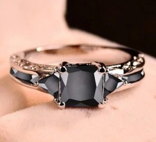 Silver ring with black centre